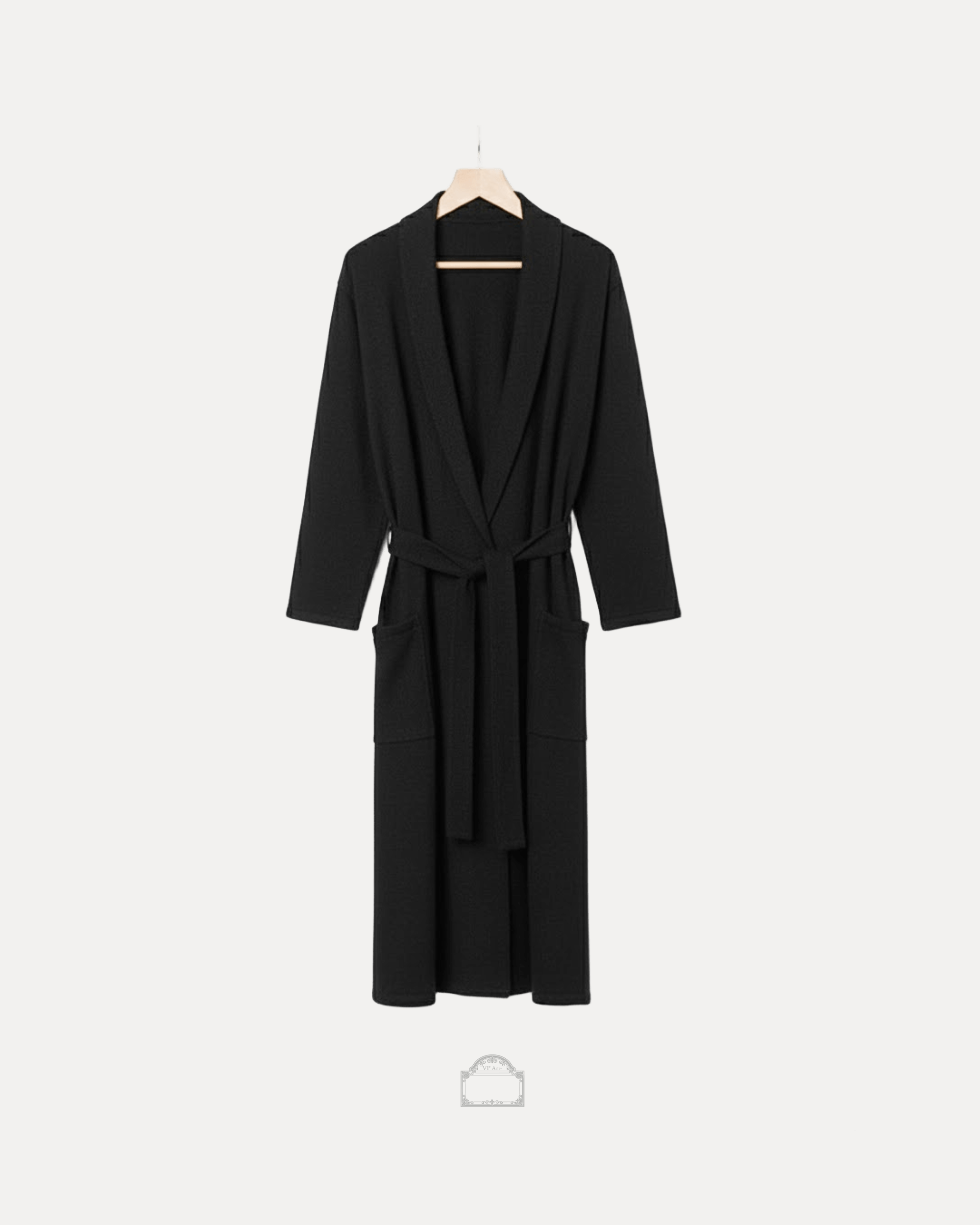Black cachemire bathrobe featuring a textured waffle pattern and a tie closure, perfect for relaxation at home.
