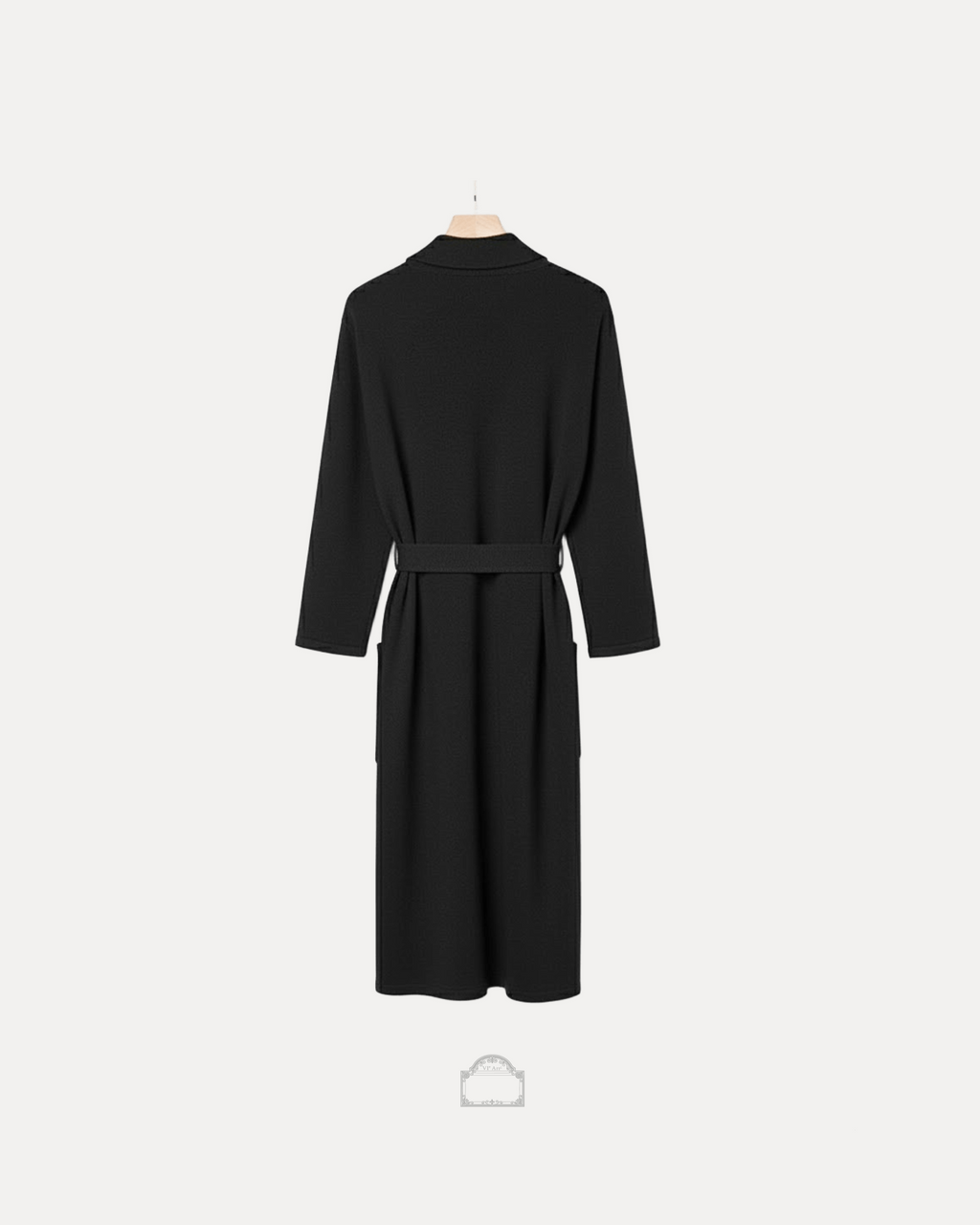 Back view of a black cachemire bathrobe with long sleeves and a belt, showcasing its elegant design.