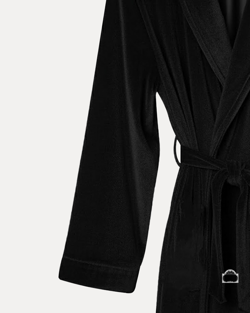 Black velour bathrobe showcasing soft texture and elegant design, perfect for modern comfort.
