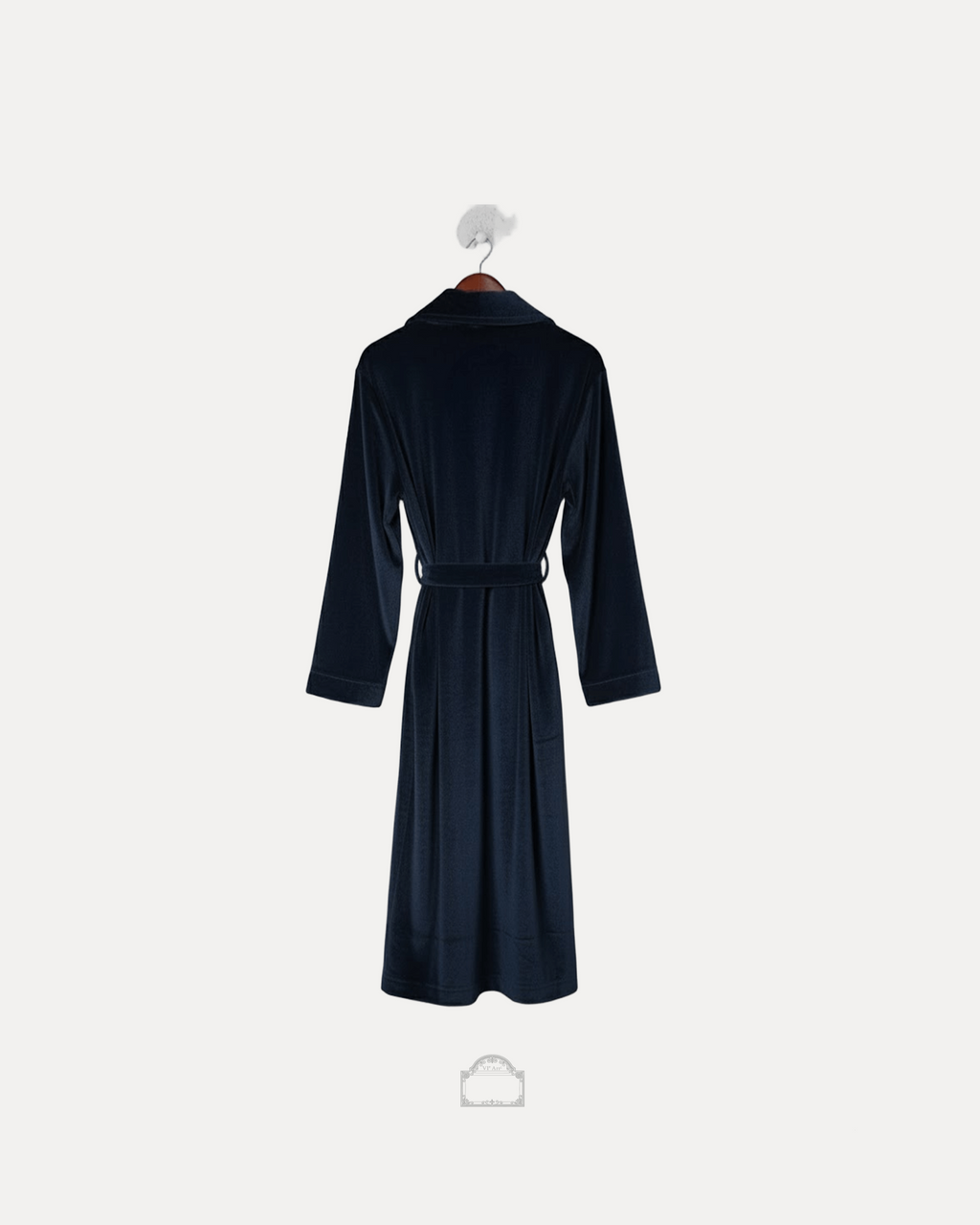 Back view of a blue velour bathrobe on a hanger showcasing its elegant design and soft texture.