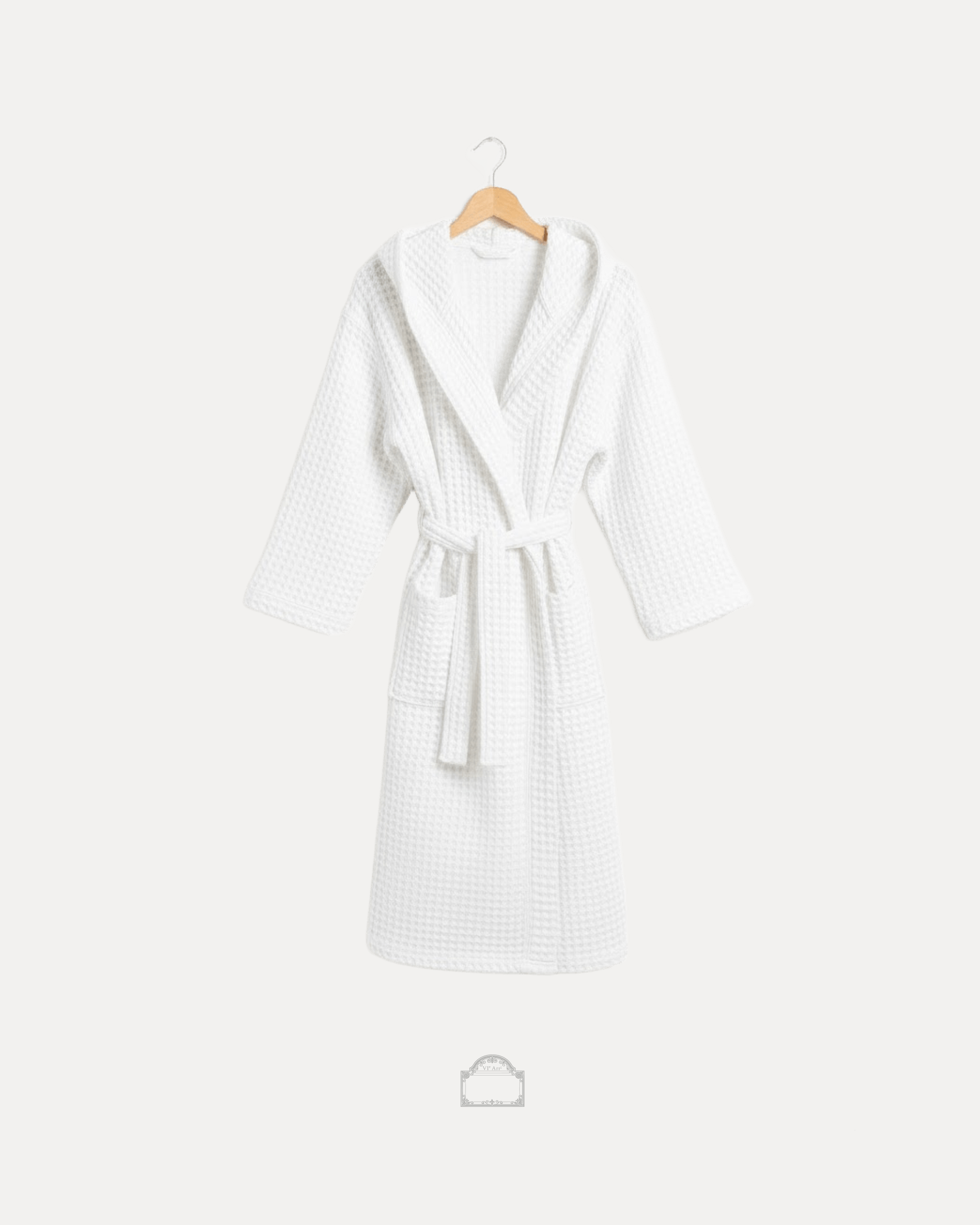 Front view of white waffle bathrobe with hood and pockets